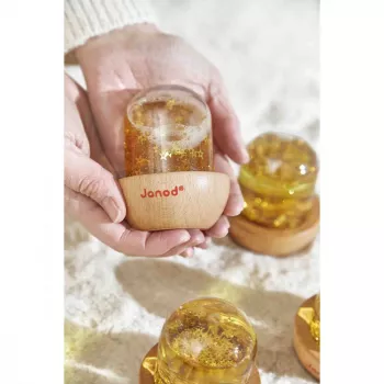 Boule à neige sensorielle Janod jaune 12m+