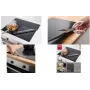 Tapis de protection pour plaque à induction Metaltex 610 x 520 mm noir fibre de verre avec revêtement silicone 252495000